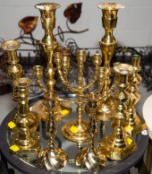 EIGHT BRASS CANDLESTICKS; SABB