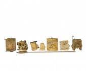 Eight brass clock movements in