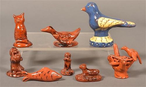 EIGHT BREININGER POTTERY MOLDED