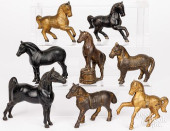 EIGHT CAST IRON HORSE STILL BA