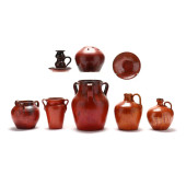 EIGHT CHROME RED GLAZED POTTER
