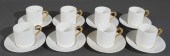 EIGHT COALPORT DEMITASSE CUPS