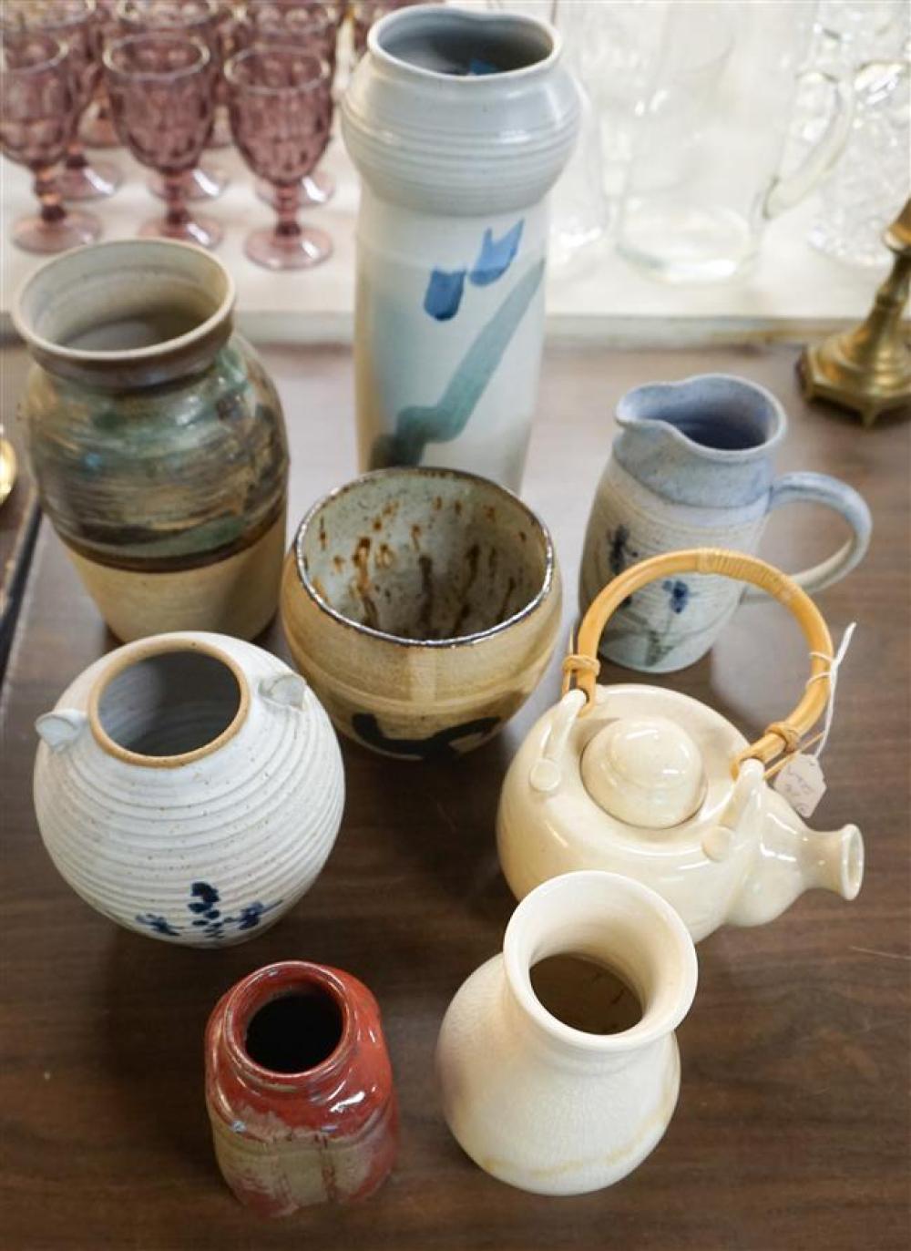 EIGHT CONTEMPORARY CERAMIC TABLE