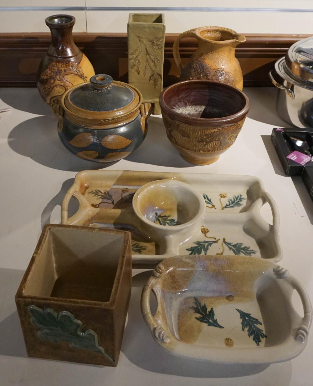 EIGHT CONTEMPORARY POTTERY TABLE