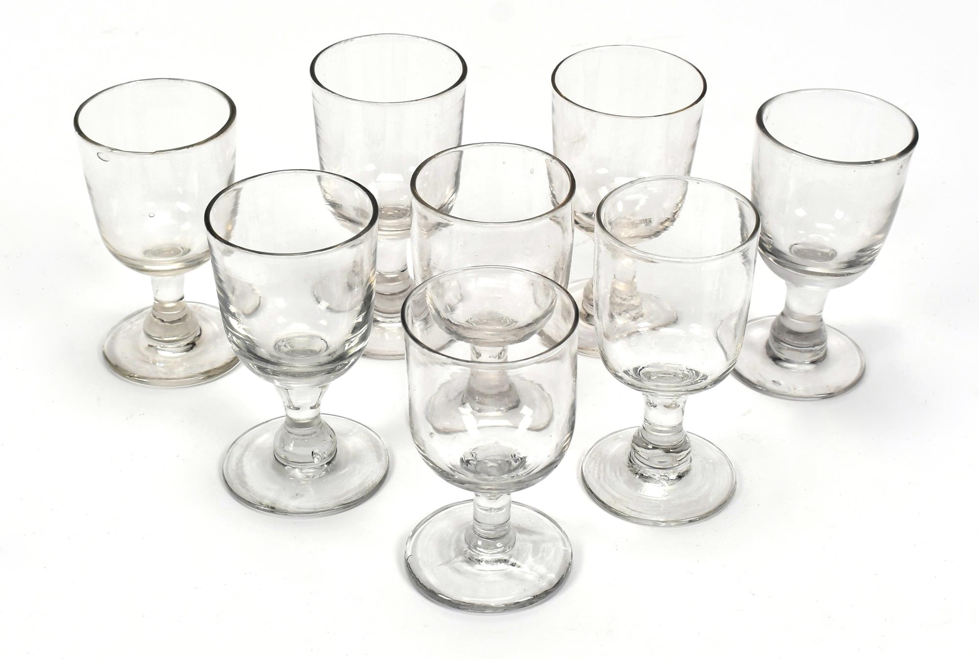 EIGHT EARLY GLASS RUMMERS. Set of