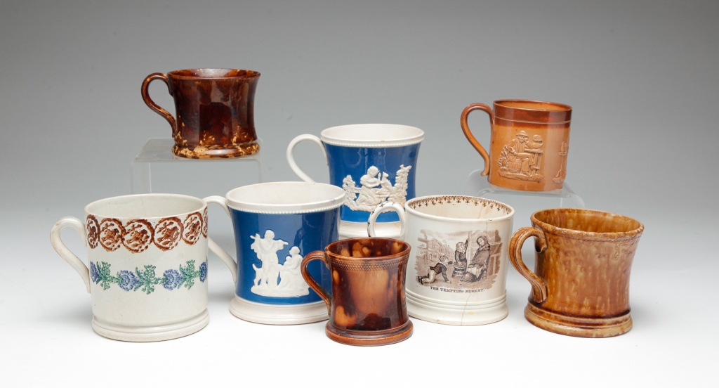 EIGHT ENGLISH EARTHENWARE MUGS. Mid