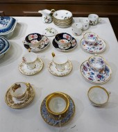 EIGHT EUROPEAN PORCELAIN CUPS