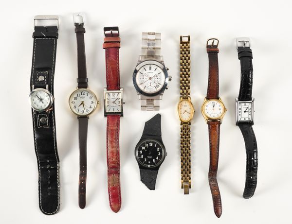 EIGHT FASHION WATCHES (8) To