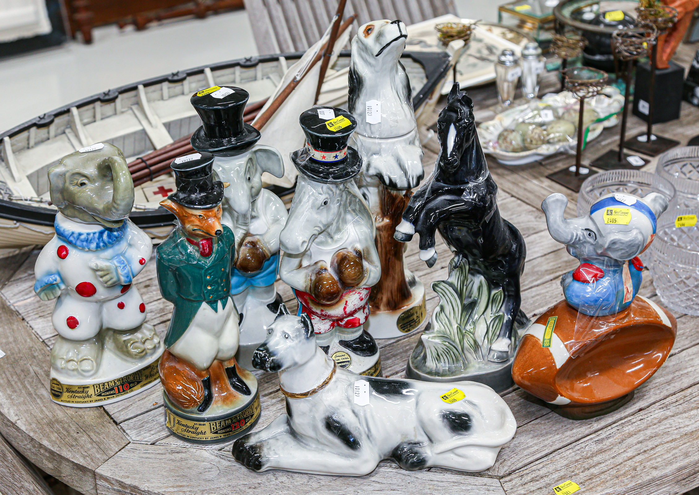 EIGHT FIGURAL JIM BEAM DECANTERS