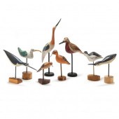 EIGHT FOLKY CARVED AND PAINTED