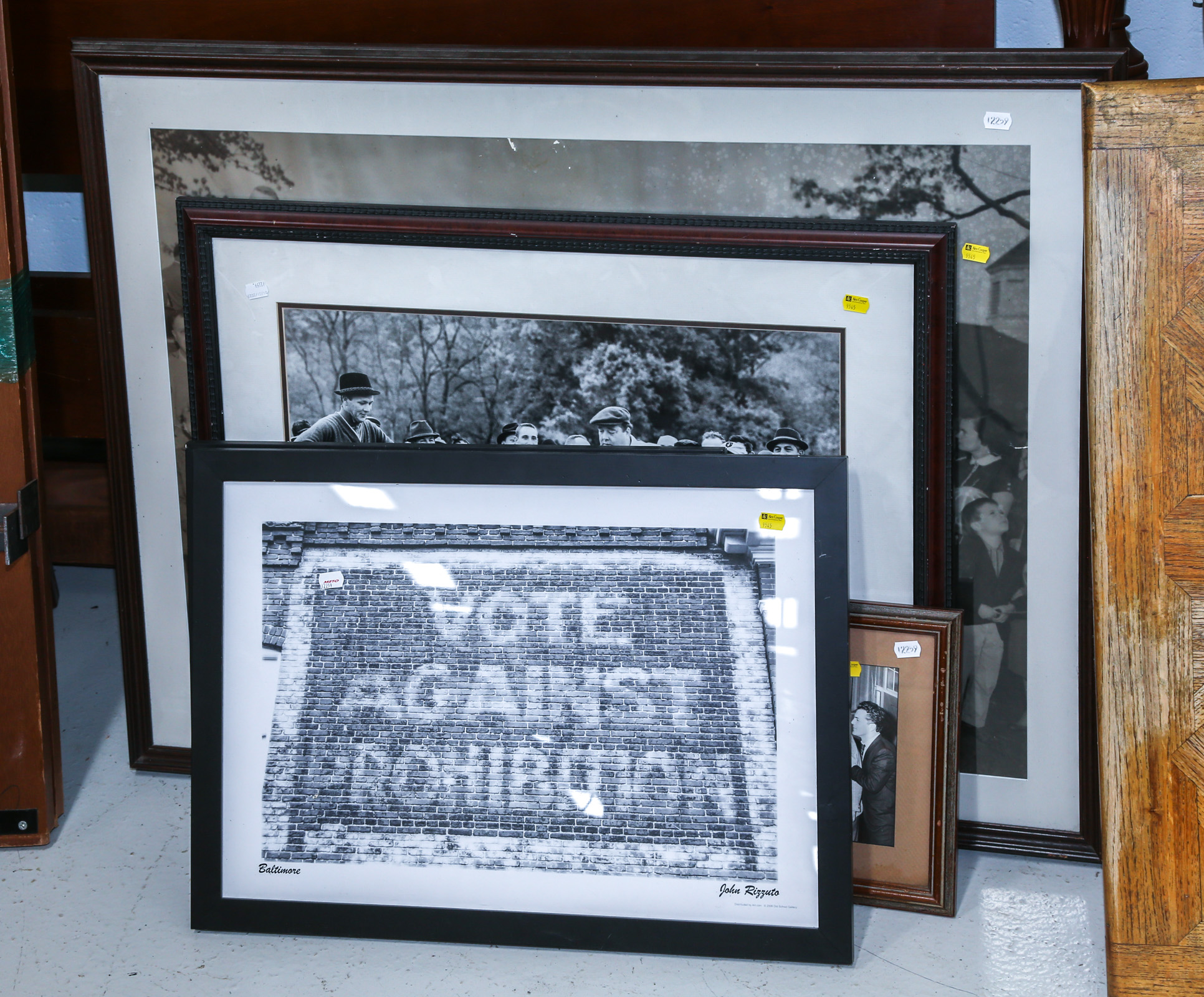 EIGHT FRAMED PHOTOS .