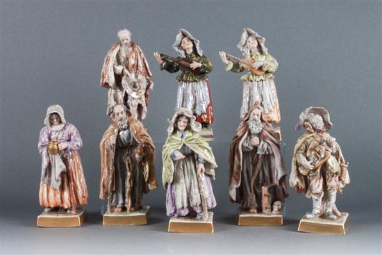 Eight German porcelain figures of
