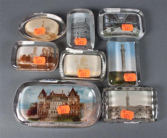 Eight glass paperweights with inset
