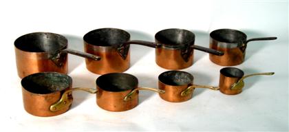 Eight graduated sized sauce pans