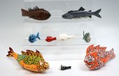 EIGHT HAND-CARVED AND PAINTED