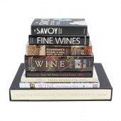 EIGHT HARDCOVER BOOKS ON COCKT