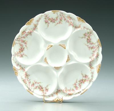 Eight Haviland oyster plates:
