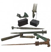 EIGHT IRANIAN BRONZE AND IRON