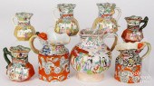 EIGHT IRONSTONE PITCHERS, 19TH