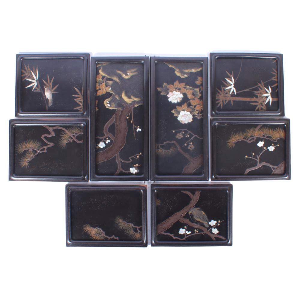 EIGHT JAPANESE BLACK LACQUER PANELS