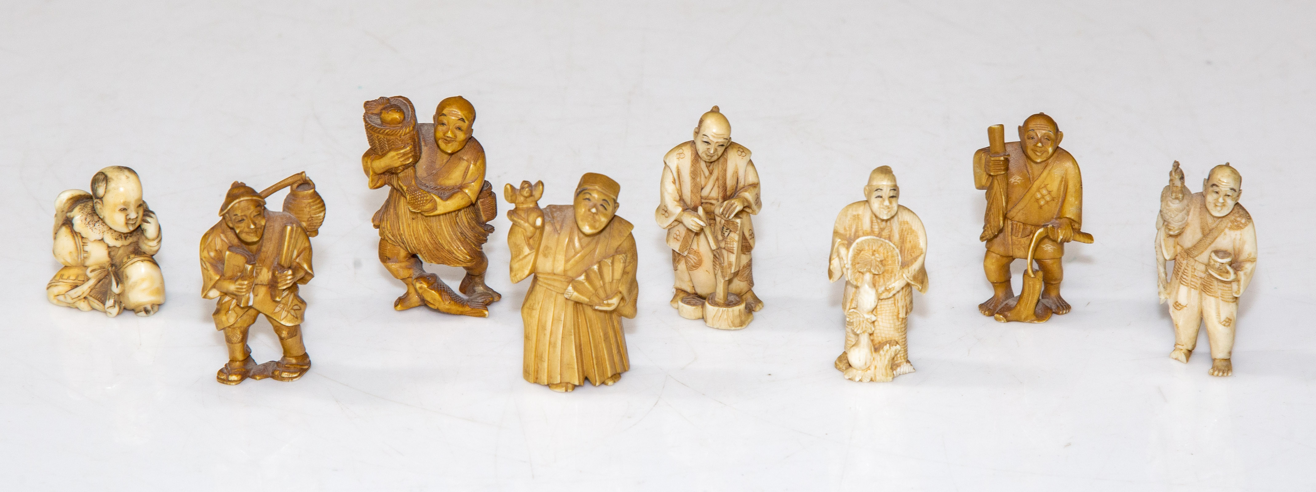 EIGHT JAPANESE CARVED MINIATURE