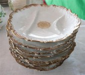 EIGHT LIMOGES OYSTER PLATESEig
