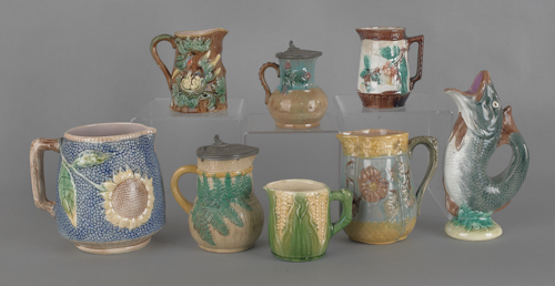 Eight majolica pitchers tallest - 6