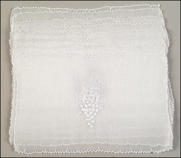 EIGHT MARGHAB COCKTAIL NAPKINS.