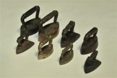 EIGHT MINIATURE SAD IRONS. Ame