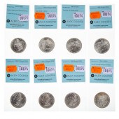 EIGHT MINT STATE MORGAN DOLLAR