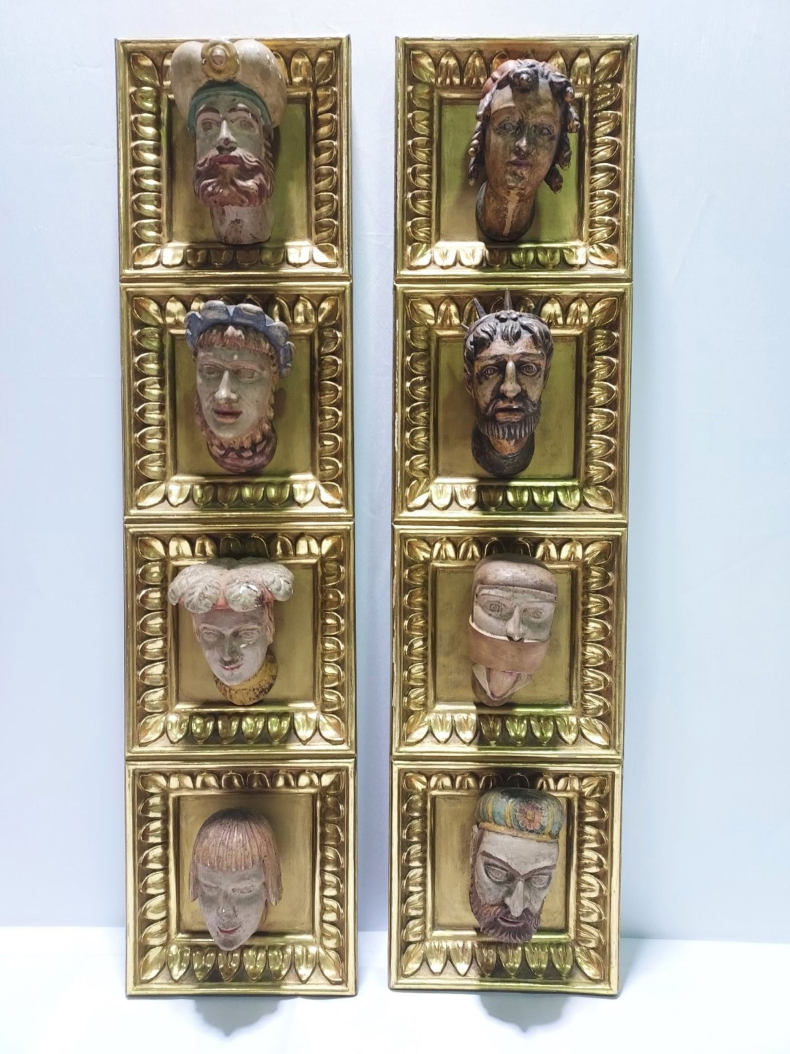 EIGHT MOUNTED CARVINGS AFTER THE
