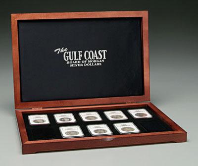 Eight MS-64 Morgan silver