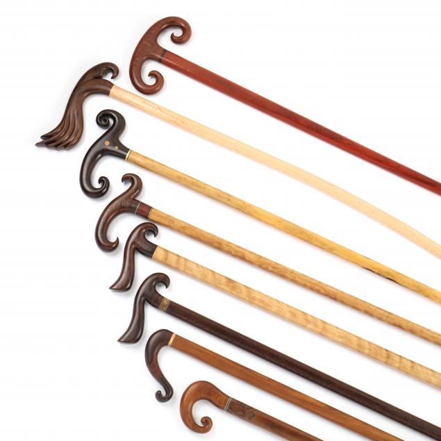 EIGHT ORGANIC SHAPED EXOTIC WOOD