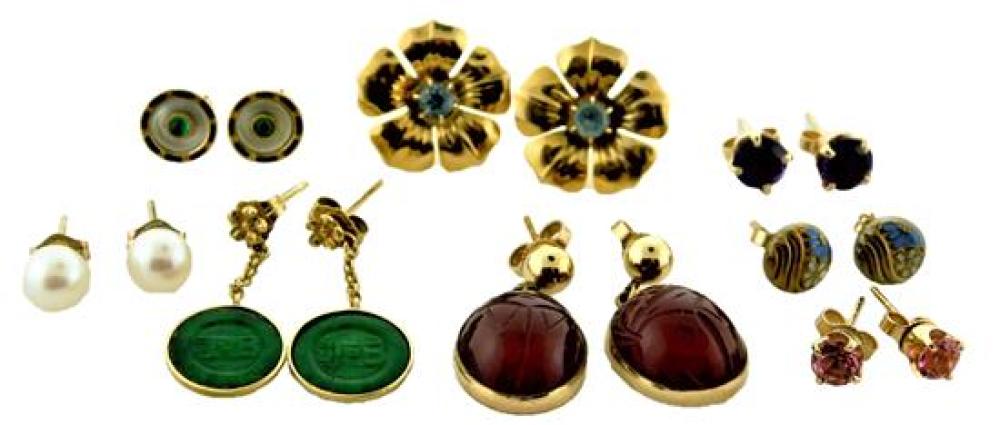 EIGHT PAIRS OF PIERCED EARRINGS