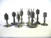 Eight pewter cylinder fonted l