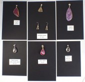 EIGHT PIECE PENDANT AND EARRIN
