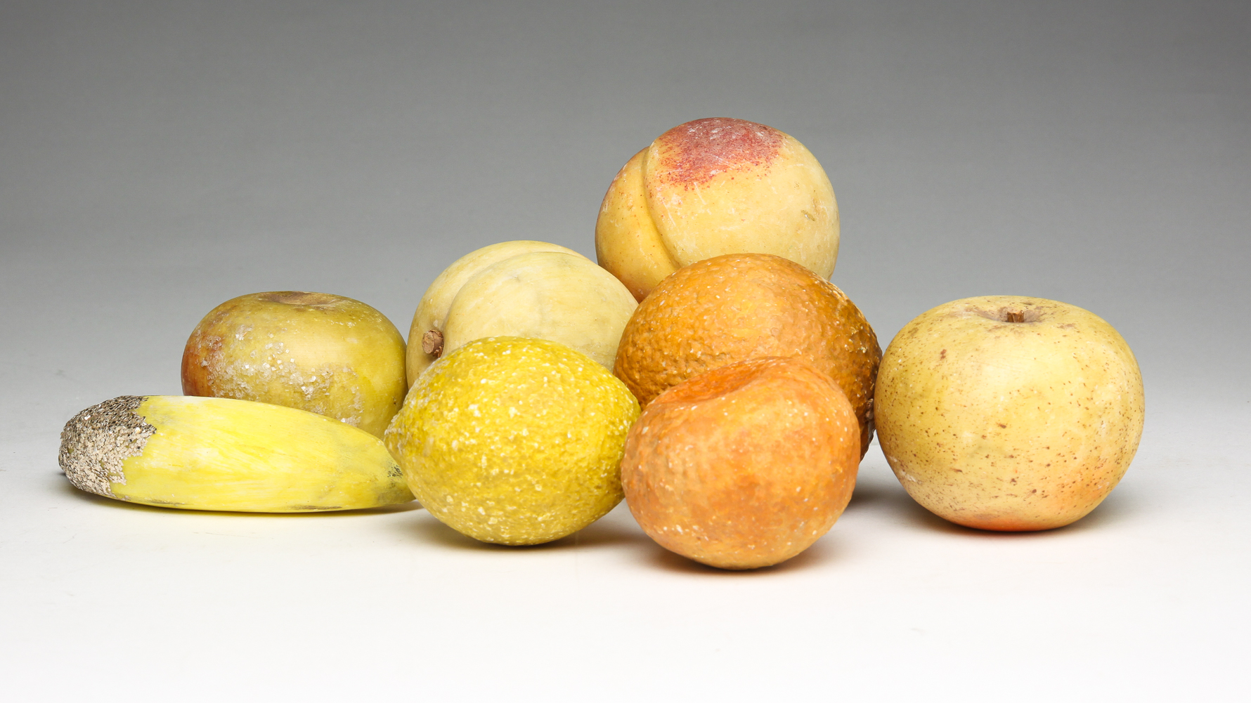 EIGHT PIECES OF STONE FRUIT.