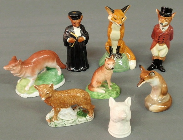 Eight porcelain fox figures