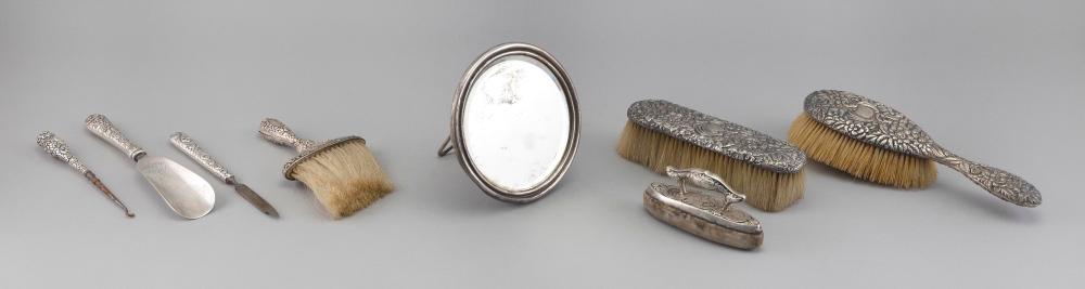 EIGHT REPOUSSE STERLING SILVER