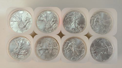 EIGHT ROLLS OF SILVER EAGLES, 1 OZ.