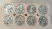 EIGHT ROLLS OF SILVER EAGLES,