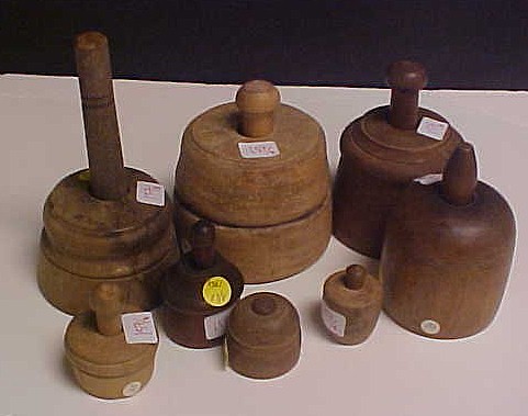 Eight round wooden cup type mold