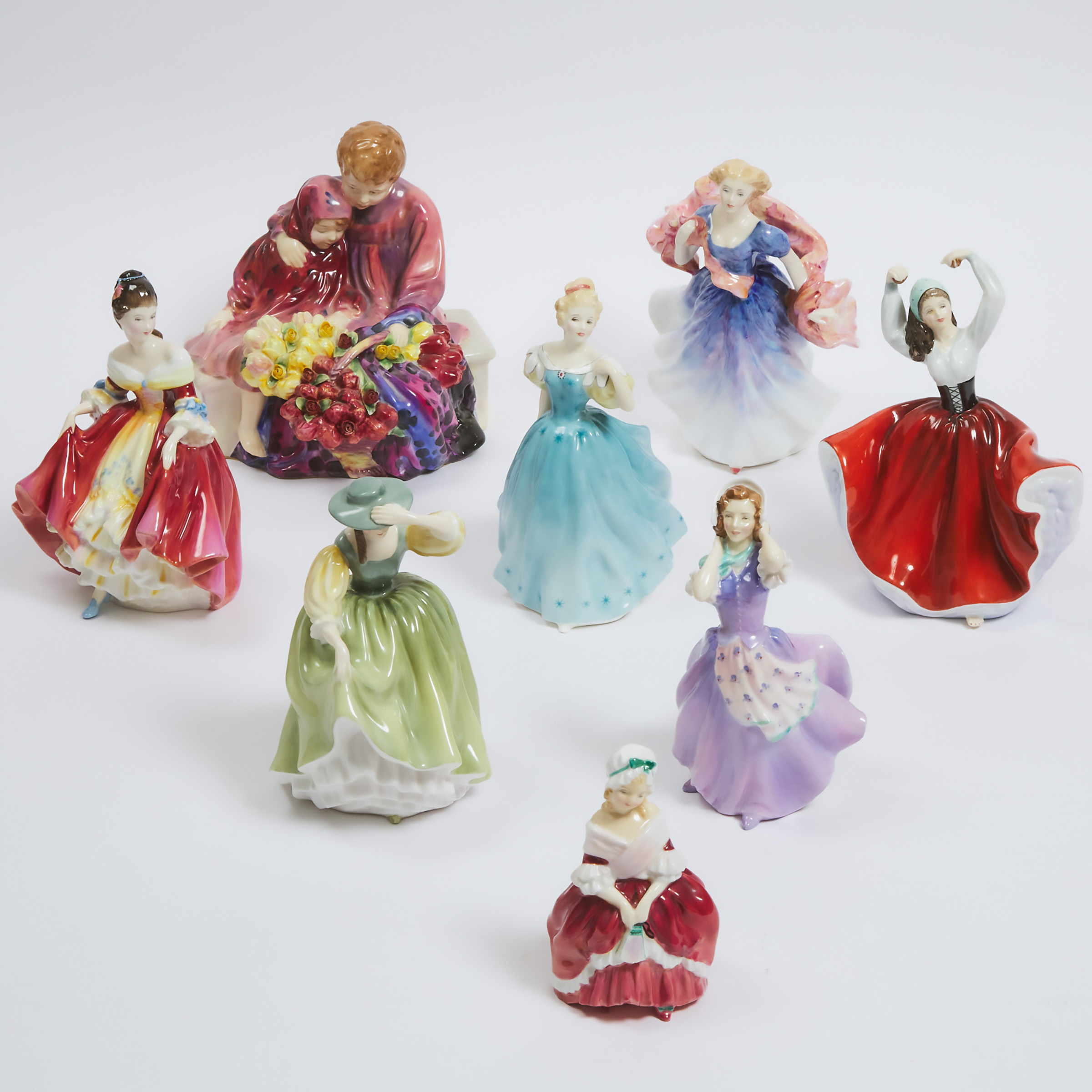 Eight Royal Doulton Figures, 20th