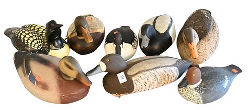 EIGHT SIGNED/STAMPED HAND CARVED