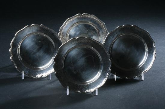 EIGHT SILVER BREAD AND BUTTER