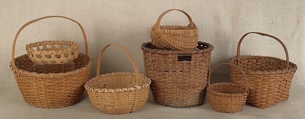Eight splint oak baskets. ?