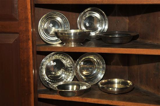 EIGHT STERLING SILVER BOWLS. All