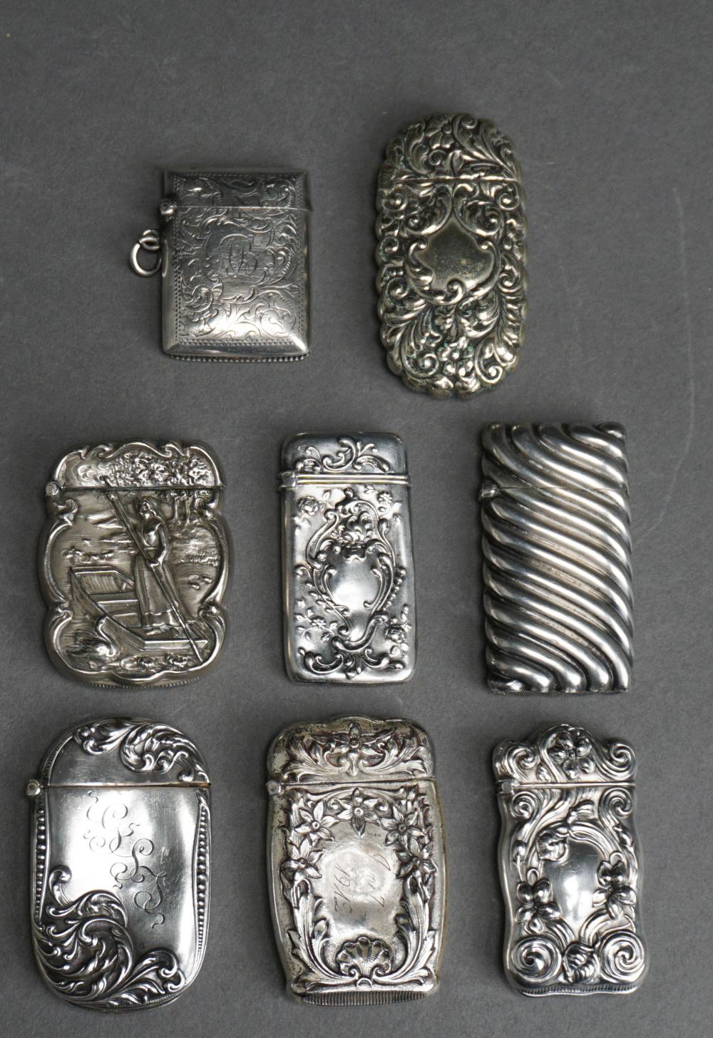 EIGHT STERLING SILVER MATCH