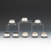 EIGHT STERLING SILVER SALT CEL