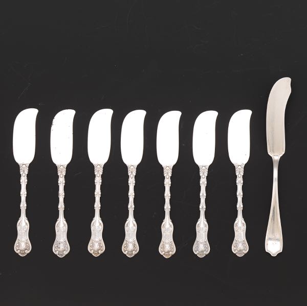 EIGHT STERLING SILVER SPREADERS 